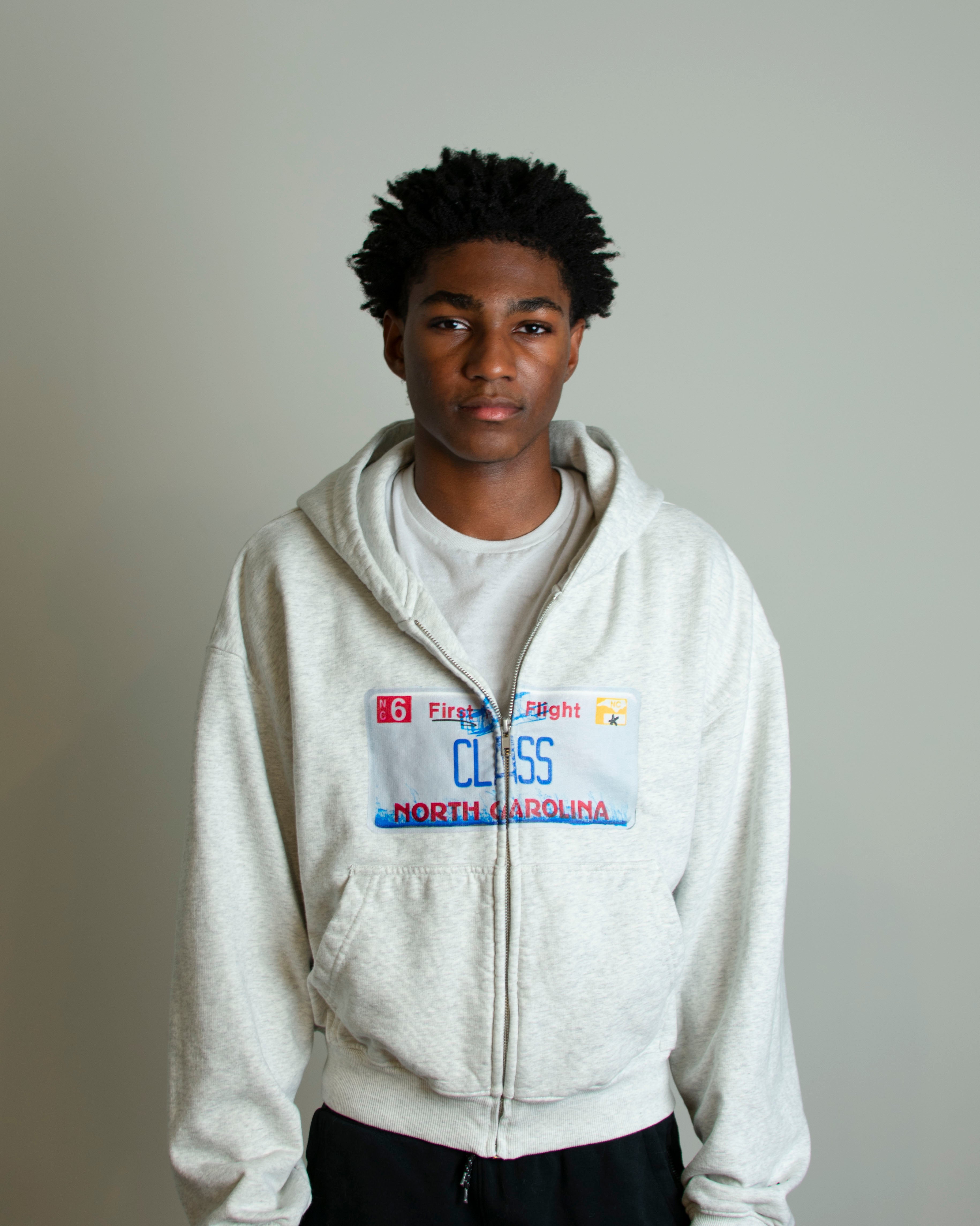 FIRST IN FLIGHT, zip up